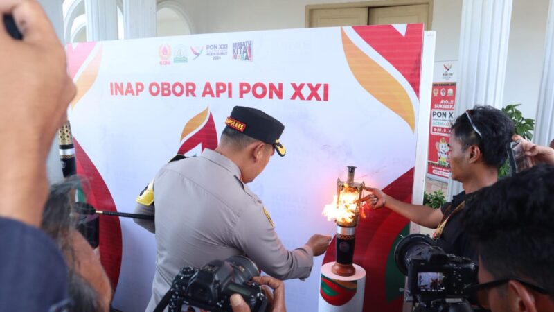 Kapolres Aceh Besar Sambut Kedatangan Kirab Api PON XXI Aceh-Sumut 2024