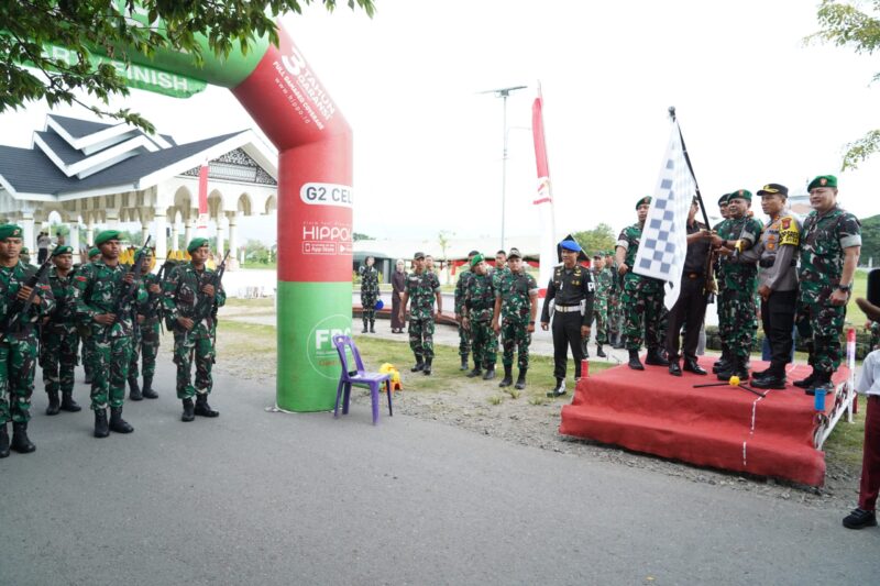 Mayor Jenderal TNI Niko Fahrizal, M.Tr.(Han), yang diwakili Komandan Korem 011/Lilawangsa (Danrem 011/LW), Kolonel Inf Ali Imran, memimpin Upacara Penyerahan Simbol dan Pemberangkatan Peleton Beranting Yudha Wastu Pramuka Jaya Tahun Anggaran 2024. 