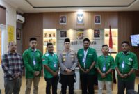 Kapolres Pidie Jaya, AKBP Ahmad Faisal Pasaribu, S.H., S.I.K., M.H., Dan Pengurus Pimpinan Cabang (GP) Ansor Pidie Jaya Kamis (23/01/2025) di Mapolres Pidie Jaya. I foto.ist