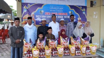 Santunan Anak Yatim-piatu, Warnai Buka Puasa Bersama Warga Teupin Peuraho.berlangsung di halaman Meunasah  Dusun Teupin Peuraho Gampong Teupin Peuraho kecamatan Meureudu Pidie Jaya. Sabtu sore (22-03-2025) foto Jurnalis TLii.